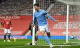 John Stones ăn mừng bàn mở tỉ số trước M.U.