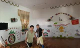 Trường Mầm non Na Mèo khắc phục hậu quả do bão lũ gây ra. Ảnh: N.H 