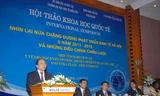 Cần giảm thuế phí, chi tiêu công