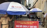 Lực lượng chức năng phong tỏa khu vực phát hiện các ca bệnh tại phường Thanh Xuân Trung (quận Thanh Xuân, Hà Nội). Ảnh: PV 
