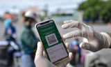TP.HCM thí điểm cấp mã QR cho người dân 3 quận, huyện trở lại làm việc