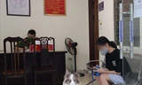 Dắt chó đi dạo trong ngày đầu Hà Nội thực hiện cách ly xã hội, cô gái bị phạt 2 triệu đồng