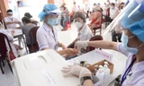 TP.HCM tiêm 104.000 liều vắc-xin một ngày, Hà Nội tạm dừng hoạt động chợ Phùng Khoang