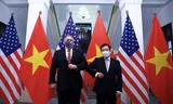 Phó Thủ tướng Phạm Bình Minh đón Ngoại trưởng Mỹ Mike Pompeo. (Ảnh: VGP)