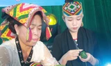Xem các cô gái Thái thi gói bánh sừng trâu, trình diễn trang phục dân tộc