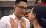 Trần Bạt bị công an dẫn đi