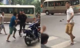 Hai nhóm côn đồ cầm hung khí truy sát nhau trên phố đi bộ. Ảnh chụp màn hình.