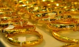 Giá vàng hôm nay 4/3: Vàng tăng, tỷ giá hạ nhiệt