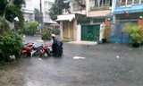 Đường phố TPHCM ngập trong mưa lớn sau kỳ nghỉ Tết