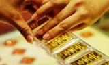 Giá vàng phục hồi, tỷ giá vẫn tăng mạnh