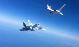 Chiến đấu cơ Su-30SM hộ tống máy bay ném bom Tu160 tấn công mục tiêu IS ở Syria.