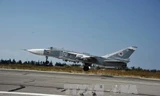 Máy bay chiến đấu Sukhoi Su-24M của Nga cất cánh từ sân bay quân sự Hmeymim, gần thành phố Latakia ngày 21/10. Ảnh: THX/TTXVN.