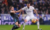 Karim Benzema (phải) vẫn luôn là con át chủ bài của Real Madrid trên tuyến tấn công. Ảnh: Getty Image.