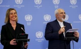 Bà Federica Mogherini, Cao uỷ Liên minh châu Âu (EU) về chính sách an ninh và đối ngoại, và Ngoại trưởng Iran Javad Zarif hôm qua phát biểu trong cuộc họp báo tại toà nhà Liên Hợp Quốc ở Vienna, Áo. Ảnh: Reuters