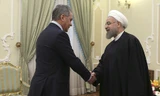 Bộ trưởng Quốc phòng Nga Sergei Shoigu (trái) và Tổng thống Iran Hassan Rouhani tại Tehran. Ảnh: AFP