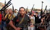 Các tay súng bộ lạc ở Iraq. Ảnh: AP.