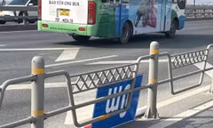 Hà Nội tạm gỡ biển báo khoảng cách trên cầu Nhật Tân