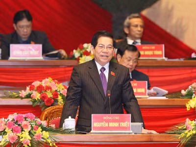 Ủy viên Bộ Chính trị, Chủ tịch nước Nguyễn Minh Triết điều khiển phiên thảo luận các văn kiện Đại hội tại hội trường sáng 14-1 Ảnh: TTXVN