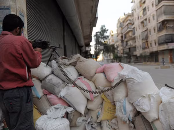 Tình hình tại một góc phố ở Syria. Ảnh: Ria-Novosti