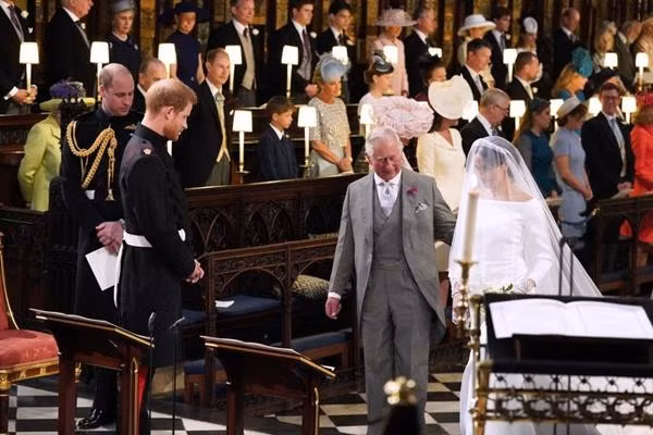 Thái tử Charles đã đứng bên Meghan thay cho cha cô vào ngày cô kết hôn. Ảnh: WPA/ Getty Images. Thái tử Charles đã đứng bên Meghan thay cho cha cô vào ngày cô kết hôn. Ảnh: WPA/ Getty Images.
