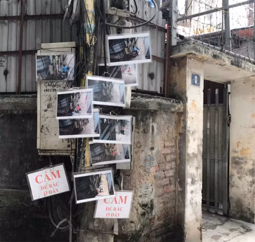 Ngõ nhỏ Hà Nội sạch bong sau khi treo ảnh người đổ rác trộm ảnh 1
