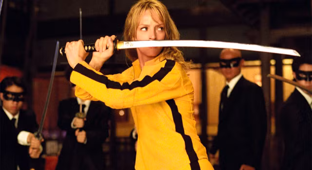 Bộ tracksuit màu vàng mà Uma Thurman mặc trong “Kill Bill”. Bộ tracksuit màu vàng mà Uma Thurman mặc trong “Kill Bill”.