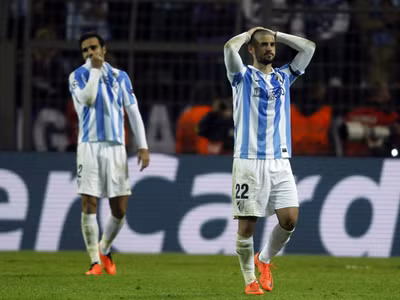Malaga cầm vàng mà để vàng rơi. Ảnh: Reuters
