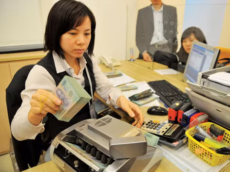 Đến nay, thanh khoản hệ thống ngân hàng cơ bản được đảm bảo. Ảnh: Hồng Vĩnh
