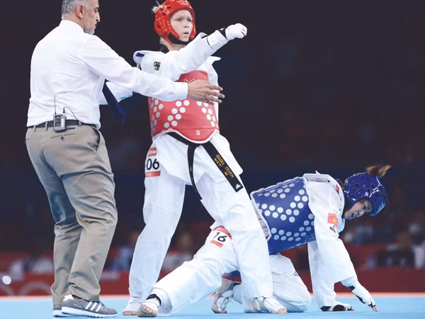 Taekwondo VN (trong ảnh là võ sỹ Diệu Linh, phải) được cho là đã được đầu tư khoảng 200.000 USD nhưng đổi lại là thất bại nặng nề tại Olympic London 2012. Ảnh: Quang Thắng. Taekwondo VN (trong ảnh là võ sỹ Diệu Linh, phải) được cho là đã được đầu tư khoảng 200.000 USD nhưng đổi lại là thất bại nặng nề tại Olympic London 2012. Ảnh: Quang Thắng