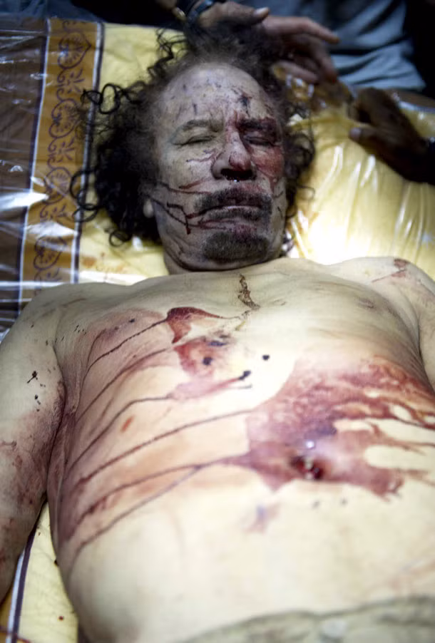 Thi thể ông Gaddafi đang được cất giữ tại Misrata. Ảnh: Mirror.co.uk