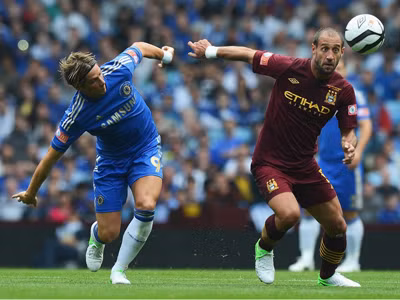 Man City (phải) và Chelsea đã cống hiến một trận đấu hấp dẫn, khai màn cho mùa giải mới của bóng đá Anh. Ảnh: Getty Images