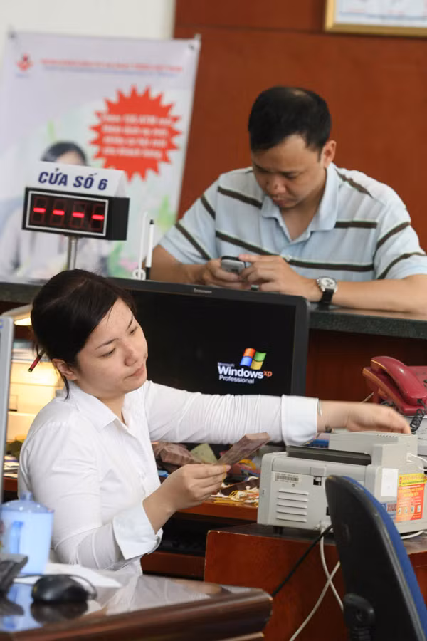 Hiện lương trung bình của các ngân hàng thương mại của Nhà nước cao nhất nước. Ảnh: Hồng Vĩnh