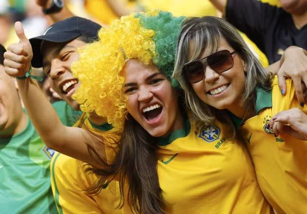 CĐV Brazil tươi cười trước trận khai mạc Confederations Cup gặp Nhật Bản trên sân Estadio Nacional tại Brasilia.