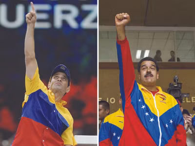 2 ứng viên Henrique Capriles (trái) và Nicolas Maduro