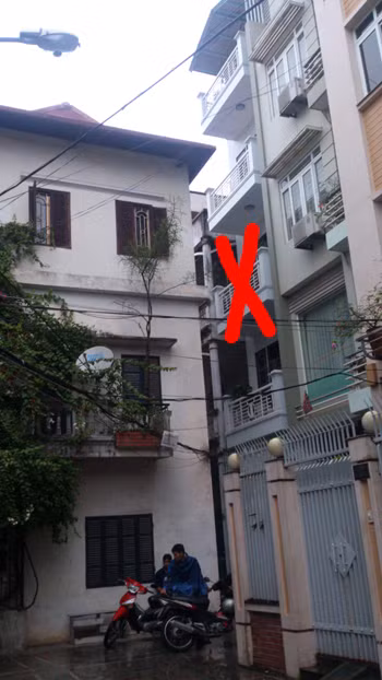 Ngôi nhà bốn tầng - nơi xảy ra vụ án mạng. Ảnh: Tuấn Nguyễn
