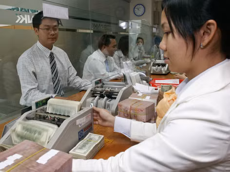 Tỷ giá VND/USD ổn định, mũi tên trúng nhiều đích. Ảnh: Như Ý