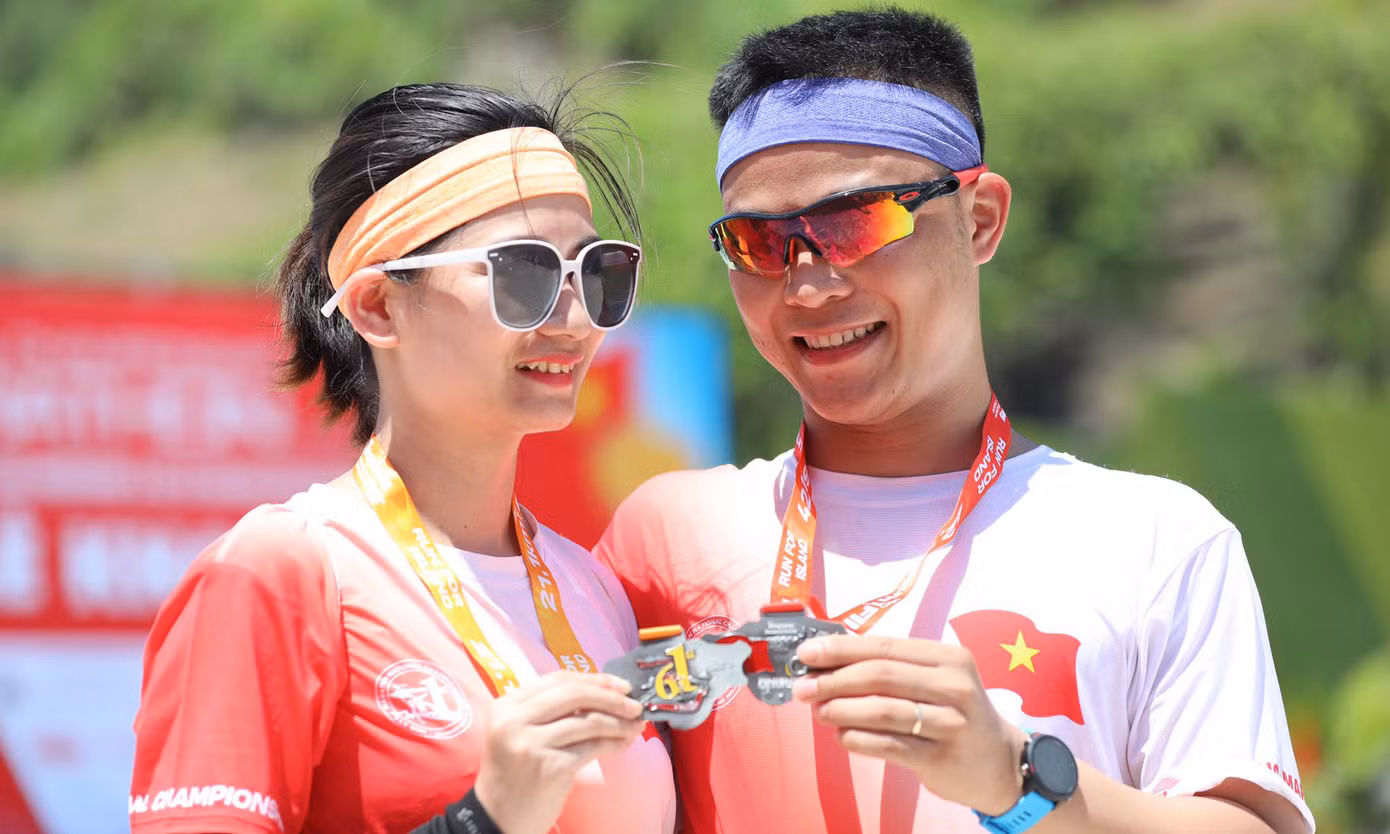 Nụ cười chiến thắng trên đường chạy giữa đại dương ảnh 13