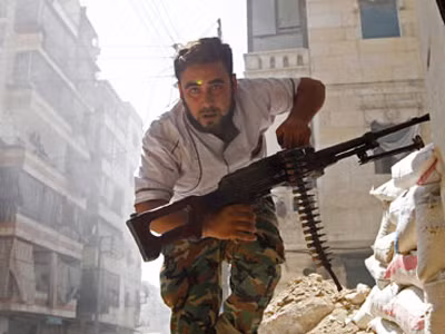 Một tay súng thuộc lực lượng nổi dậy ở Syria. Ảnh: Goran Tomasevic