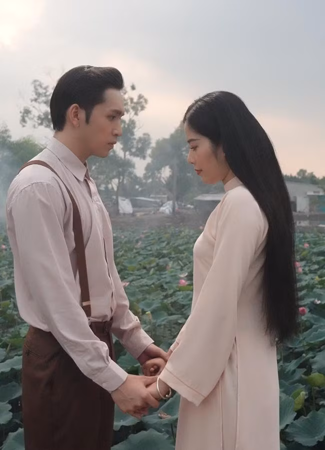 Nam Em và Bạch Công Khanh trong phim Nhà Không Bán