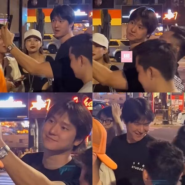 Nam diễn viên Go Kyung Pyo thoải mái trò chuyện với người hâm mộ trên đường phố.
