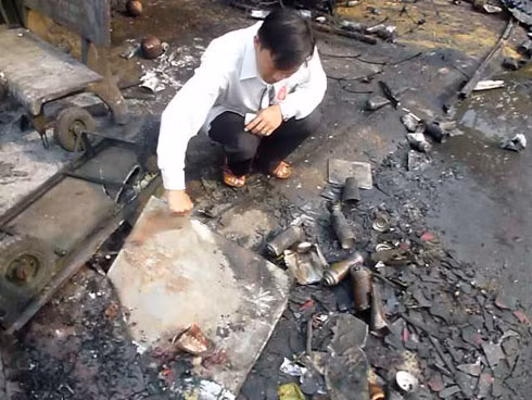 Hàng trăm bình gas mini phát nổ gây cháy lớn. Ảnh: An Nhơn