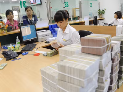 Theo NHNN, các ngân hàng không trích lập đủ dự phòng rủi ro sẽ không được chia cổ tức. Ảnh: Hồng Vĩnh