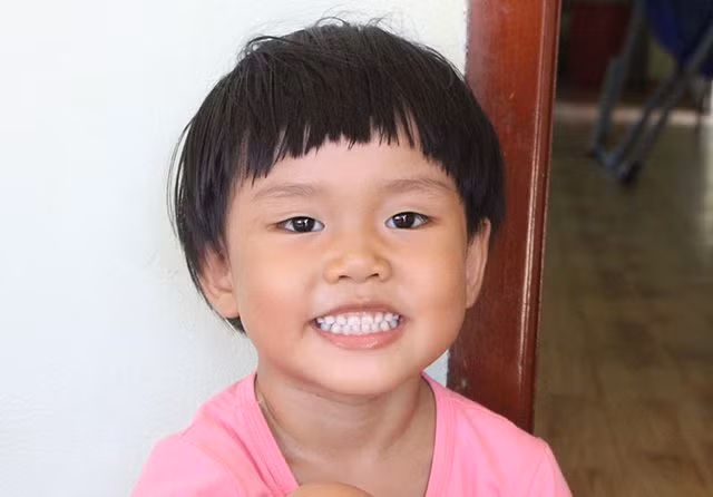 Nụ cười hồn nhiên của cô em gái út Nguyễn Ngọc Thùy.