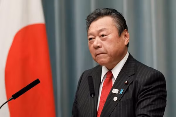 Ông Yoshitaka Sakurada. Ảnh: Reuter