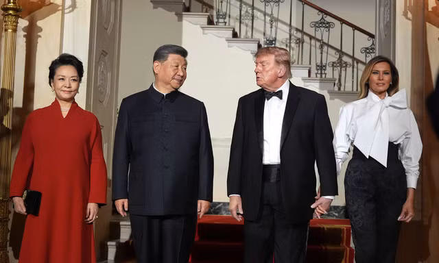 Tổng thống Mỹ Donald Trump và Phu nhân đón Chủ tịch Trung Quốc Tập Cận Bình và Phu nhân dự quốc yến tối 24/9Ảnh: AP 