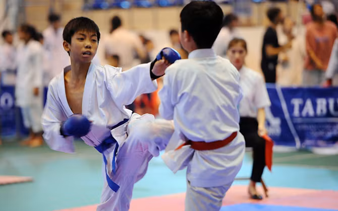 Võ sinh tranh tài tại giải Taekwondo huyện Hoài Đức mở rộng năm 2019