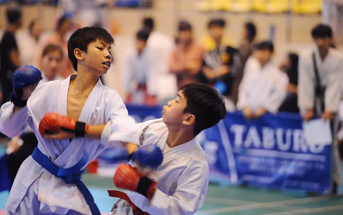 Võ sinh tranh tài tại giải Taekwondo huyện Hoài Đức mở rộng năm 2019