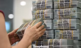 Đằng sau cuộc đua lãi suất huy động và cho vay