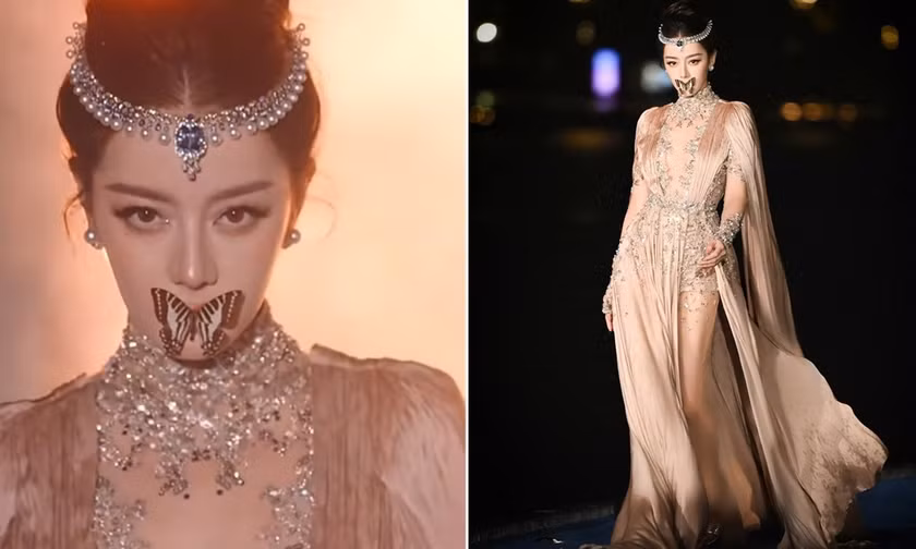 Địch Lệ Nhiệt Ba với chú bướm trên môi tại Thịnh Điển VOGUE 2026.