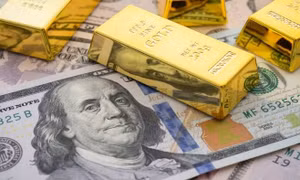 Vàng trượt giá, USD tăng mạnh sau quyết định của Fed